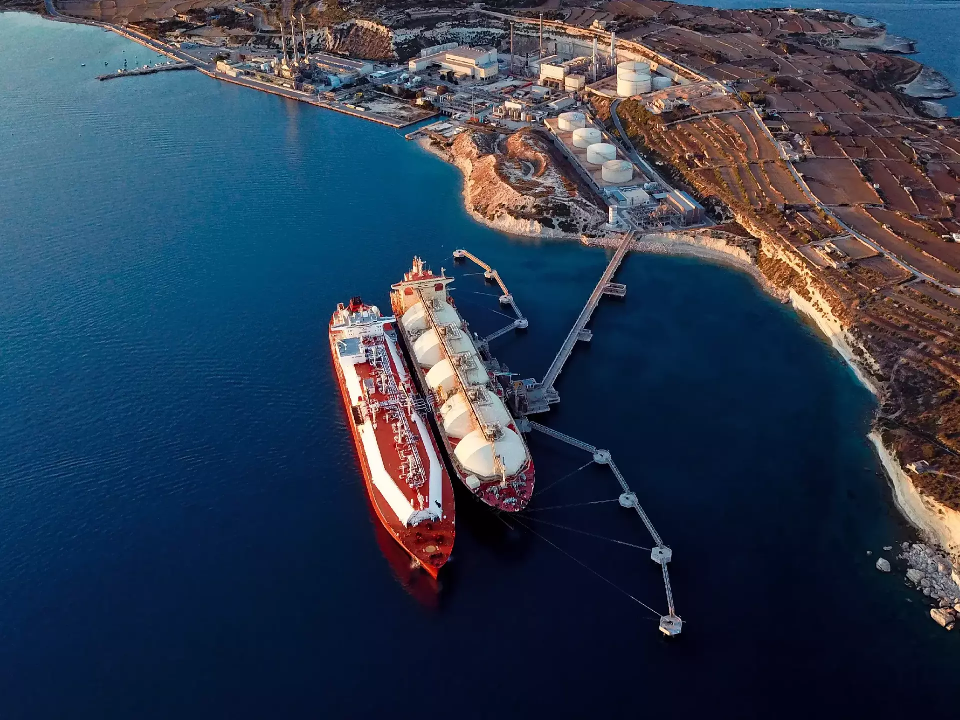 Aerial view of liquefied natural gas Ing tankers moored at harbour
